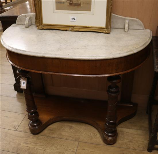 A Victorian marble top mahogany washstand W.106cm